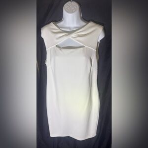 White dress perfect for wedding festivities.